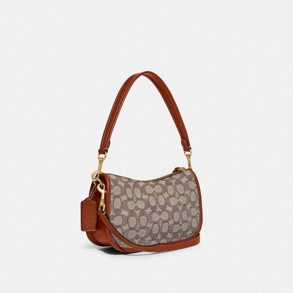 Shop COACH Swinger Signature Denim Shoulder Bag