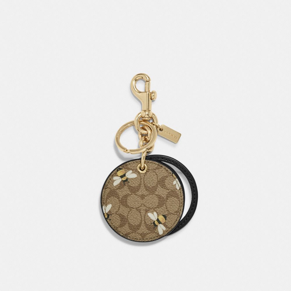 COACH® | Mirror Bag Charm In Signature Canvas With Bee Print