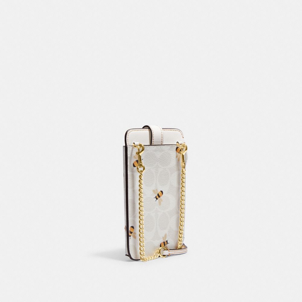 COACH®,PHONE CROSSBODY IN SIGNATURE CANVAS WITH BEE PRINT,Mini,Gold/Chalk/Glacier White Multi,Angle View