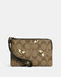 COACH®,CORNER ZIP WRISTLET IN SIGNATURE CANVAS WITH BEE PRINT,Coated Canvas/Leather,Mini,Gold/Khaki Multi,Front View