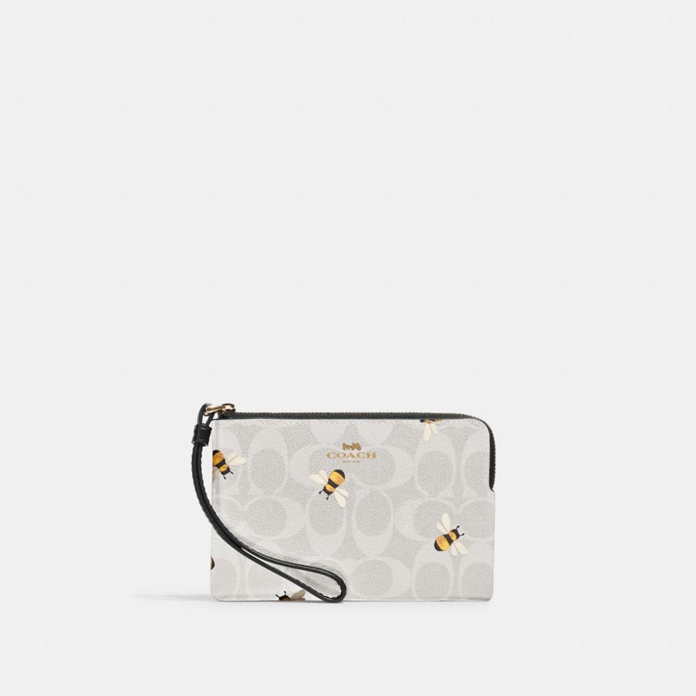 COACH®  L Zip Wristlet In Signature Canvas