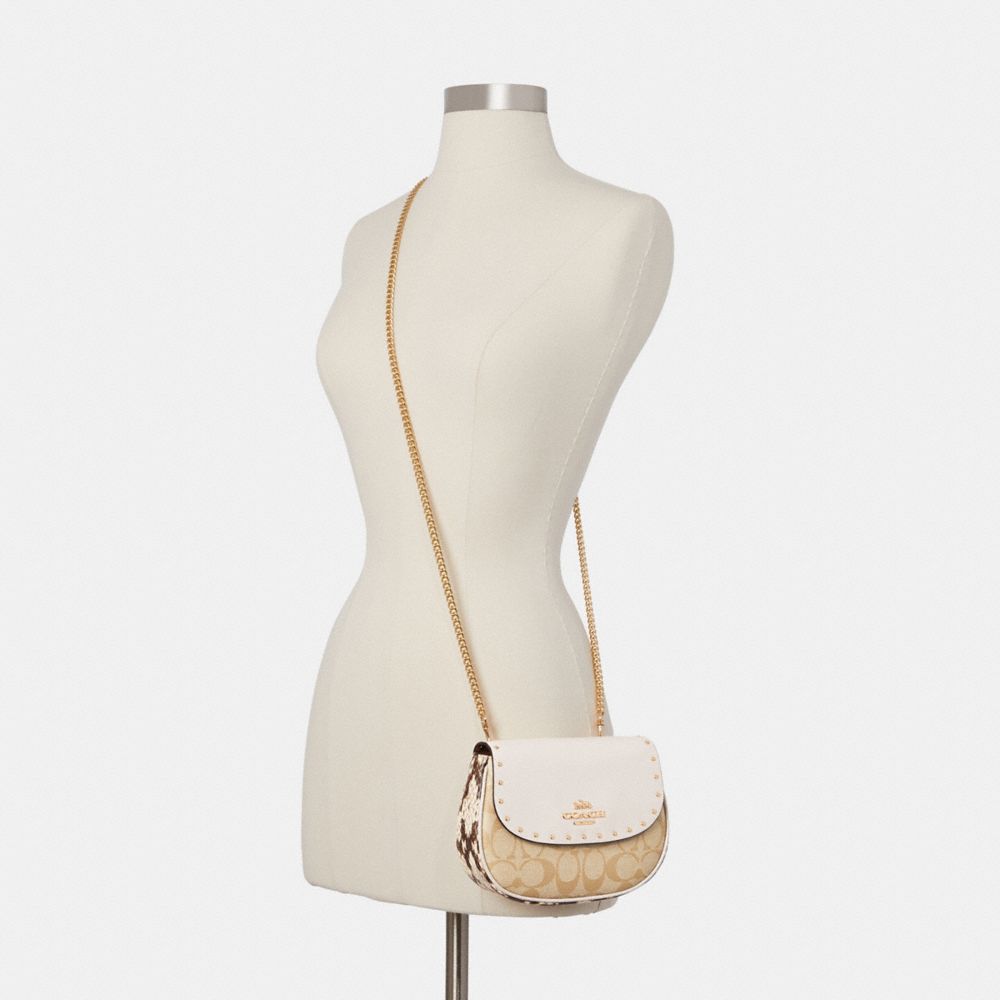 COACH®,Saddle Belt Bag In Signature Canvas,,Detail View