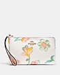 COACH®,LARGE CORNER ZIP WRISTLET WITH DREAMY LAND FLORAL PRINT,Leather,Mini,Gold/Chalk Multi,Front View