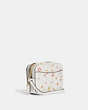 COACH®,MINI CAMERA BAG IN SIGNATURE CANVAS WITH MYSTICAL FLORAL PRINT,Gold/Chalk Multi,Angle View
