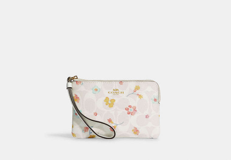 COACH®,CORNER ZIP WRISTLET IN SIGNATURE CANVAS WITH MYSTICAL FLORAL PRINT,Gold/Chalk Multi,Front View