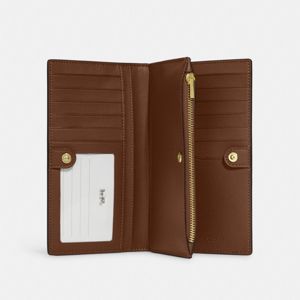 COACH OUTLET® | Slim Zip Wallet In Signature Canvas