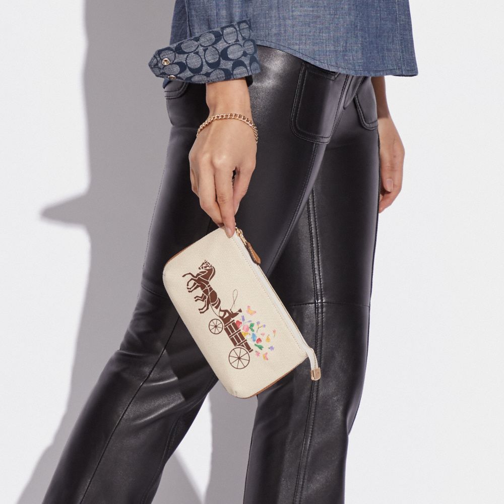 COACH®,Large Wristlet 19 With Dreamy Veggie Horse And Carriage,,Detail View