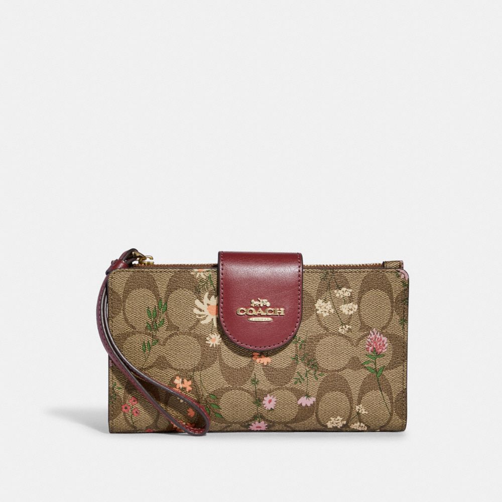 COACH®  Phone Wallet In Signature Canvas With Nostalgic Ditsy Print