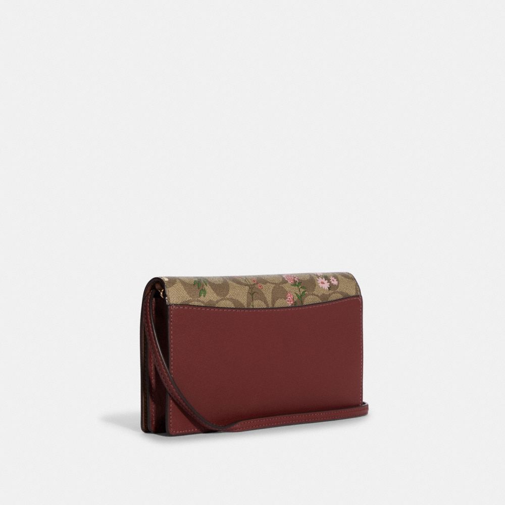 COACH® Outlet  Anna Foldover Crossbody Clutch In Signature Canvas