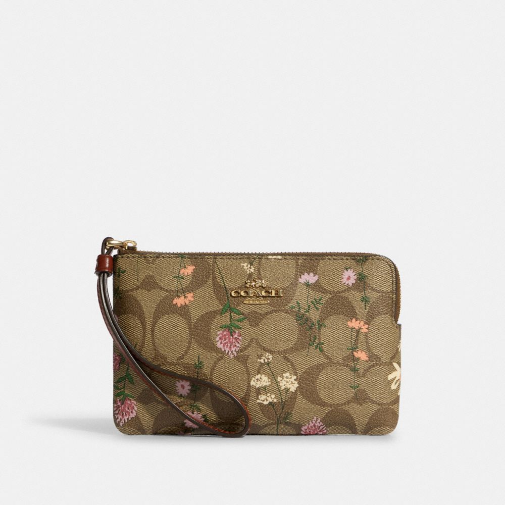 COACH®,CORNER ZIP WRISTLET IN SIGNATURE CANVAS WITH WILDFLOWER PRINT,Gold/Khaki Multi,Front View
