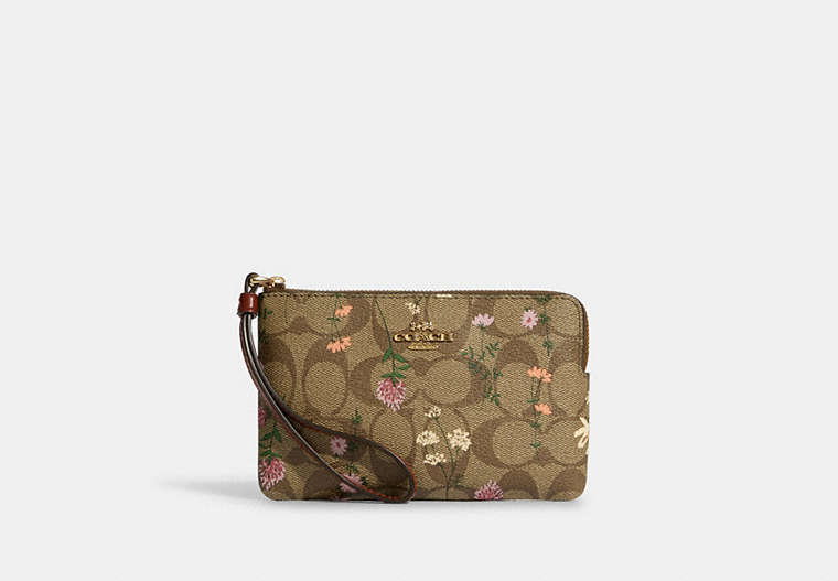 COACH®,CORNER ZIP WRISTLET IN SIGNATURE CANVAS WITH WILDFLOWER PRINT,Coated Canvas/Leather,Mini,Gold/Khaki Multi,Front View