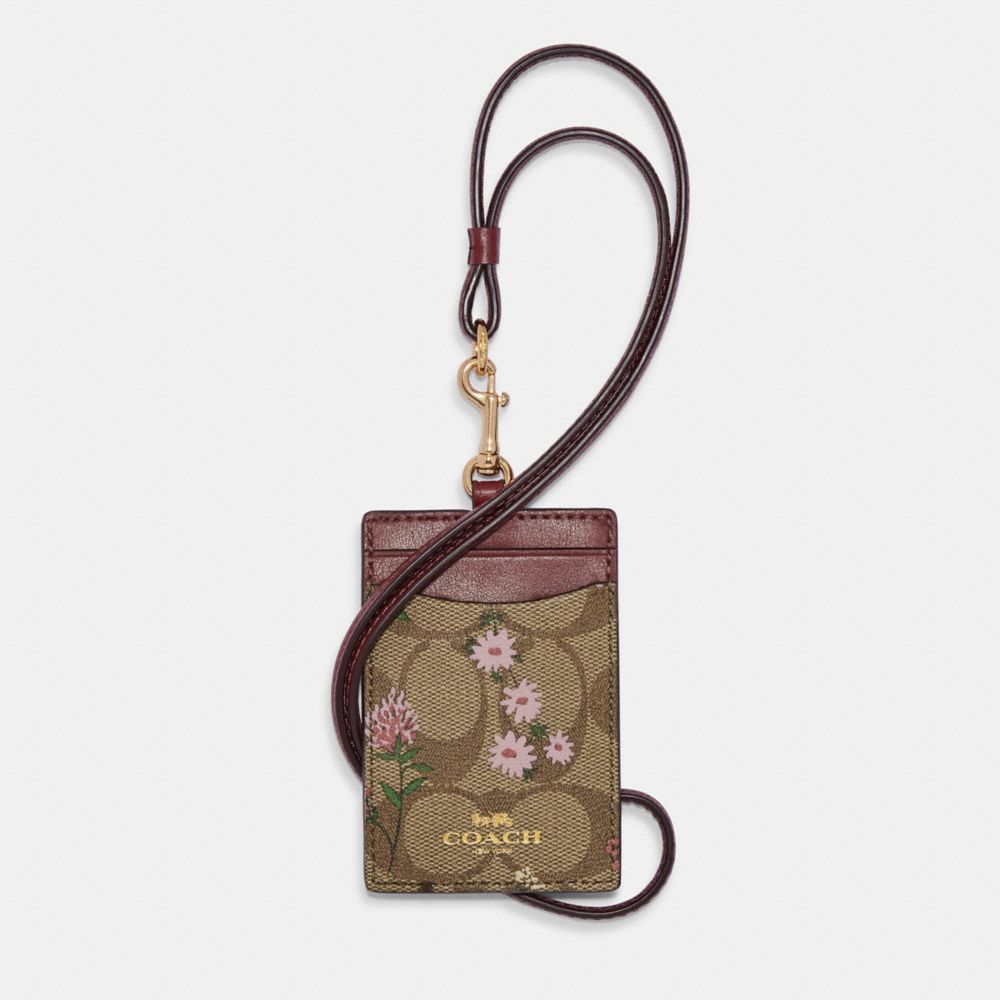 COACH®,ID LANYARD IN SIGNATURE CANVAS WITH WILDFLOWER PRINT,Coated Canvas/Leather,Mini,Gold/Khaki Multi,Front View