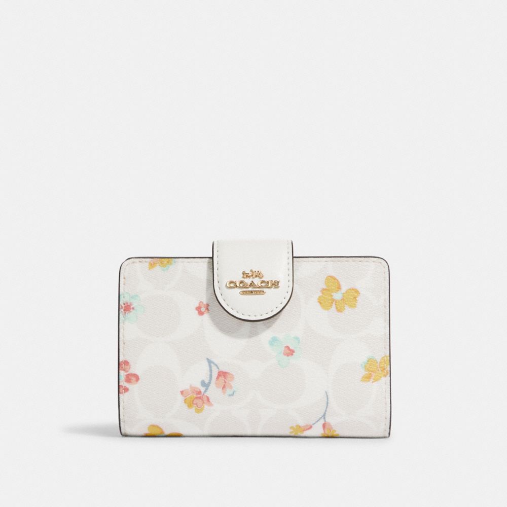 Coach dandelion floral print wallet hot sale