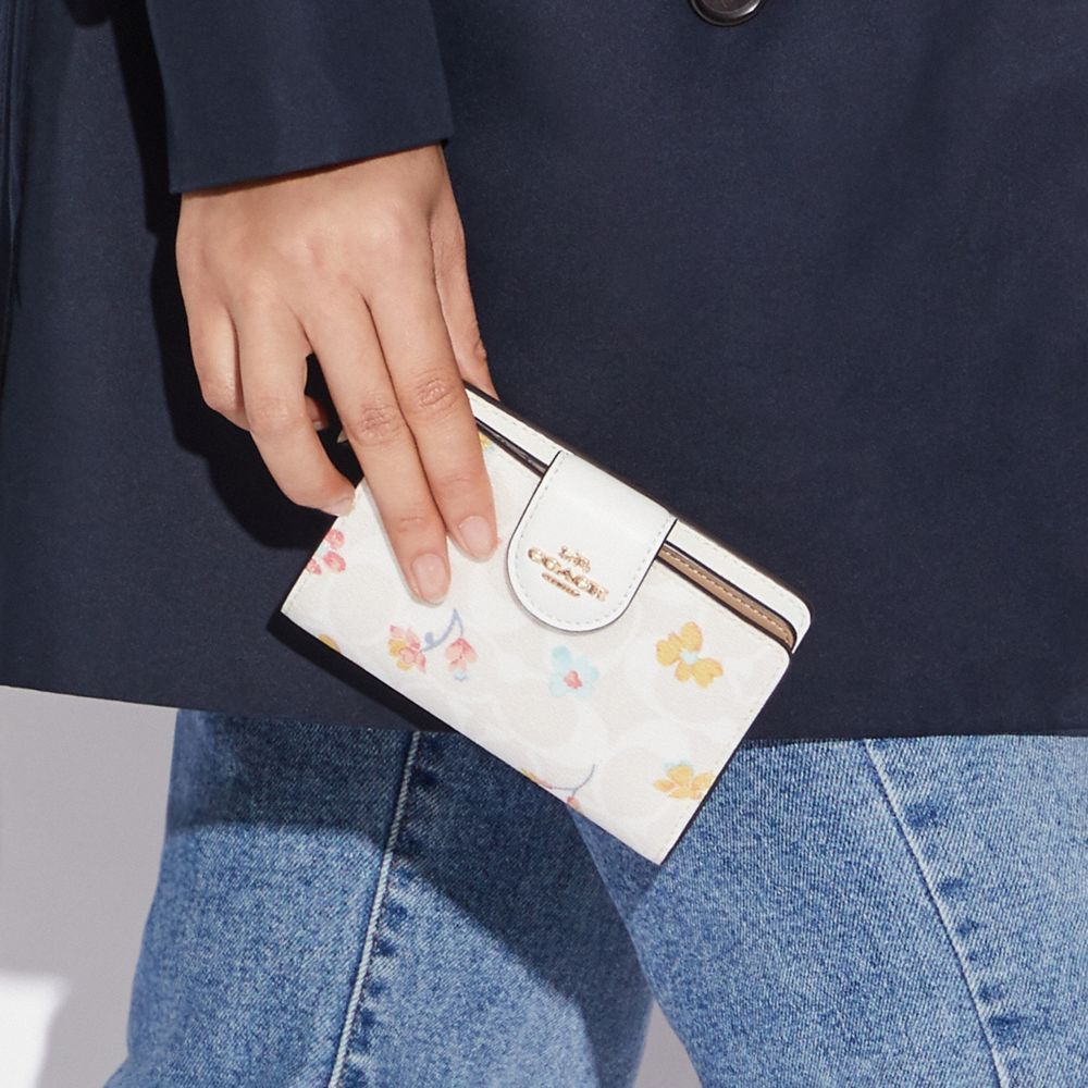 Medium Corner Zip Wallet In Signature Canvas With Mystical Floral Print