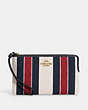 COACH®,LARGE CORNER ZIP WRISTLET IN SIGNATURE JACQUARD WITH STRIPES,Mini,Gold/Chalk Multi,Front View