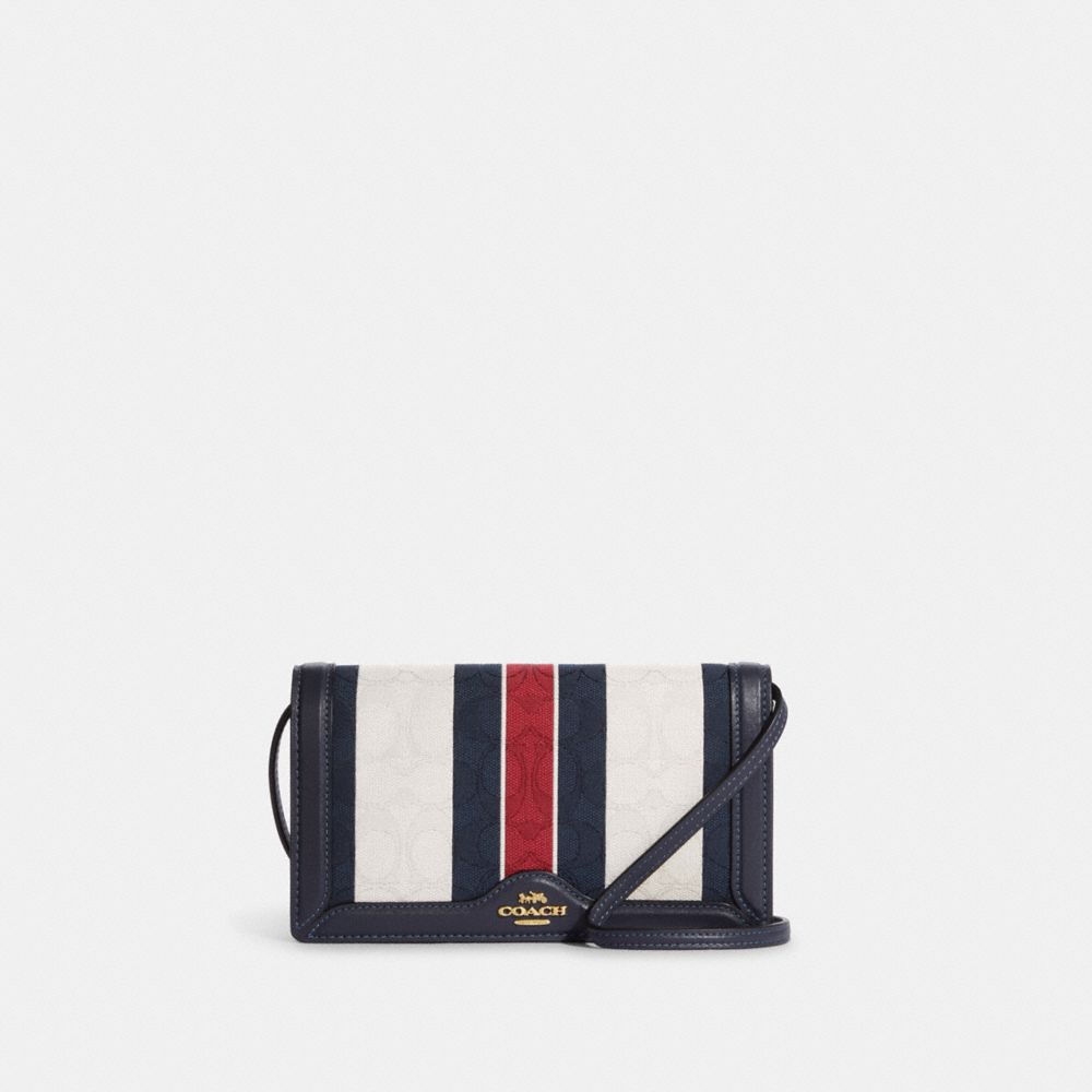 anna foldover clutch crossbody in signature jacquard with stripes