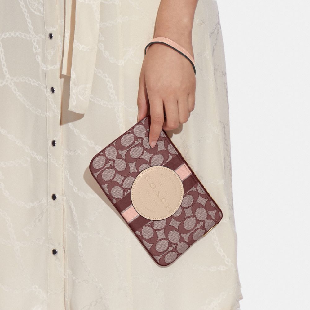 Coach Outlet's signature wristlet is just $29 right now: Save 74%