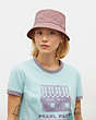 COACH®,SIGNATURE JACQUARD BUCKET HAT IN ORGANIC COTTON AND RECYCLED POLYESTER,Faded Pink,Detail View