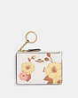 COACH®,MINI SKINNY ID CASE WITH FLORAL PRINT,Polished Pebble Leather,Mini,Brass/Chalk Multi,Front View