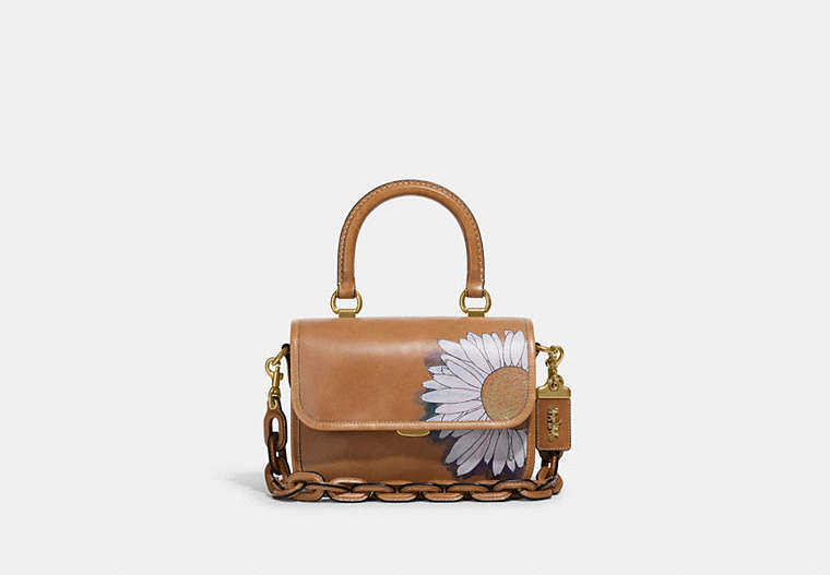 COACH®,COACH X KŌKI, ROGUE TOP HANDLE BAG IN ORIGINAL NATURAL LEATHER WITH DAISY,Leather,Small,Brass/Turmeric Nut,Front View