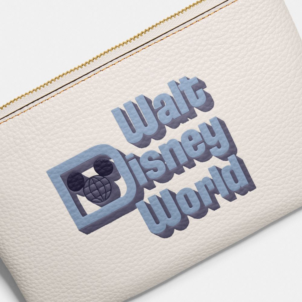 COACH®,Disney X Coach Small Wristlet With Walt Disney World Motif,,Closer View