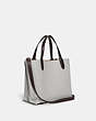 COACH®,WILLOW TOTE 24 IN COLORBLOCK WITH SIGNATURE CANVAS INTERIOR,Pebble Leather/Signature Coated Canvas,Medium,Brass/Dove Grey Multi,Angle View