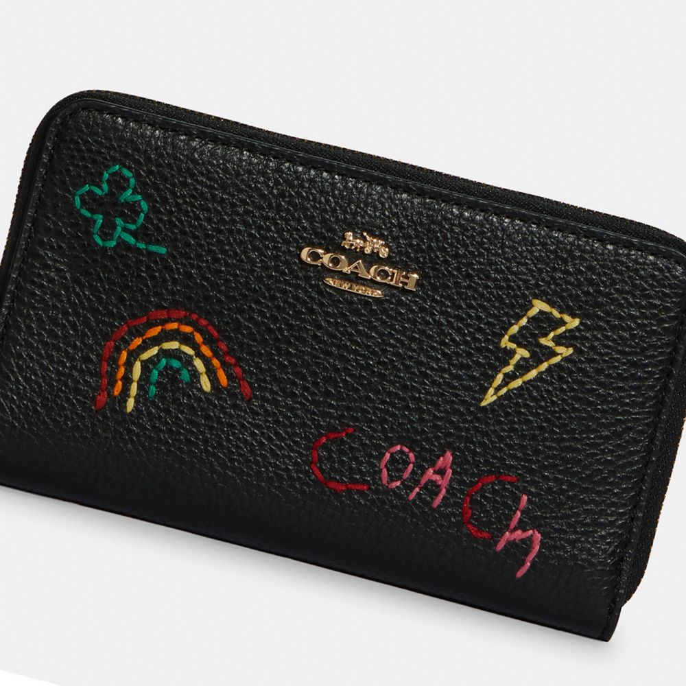 Wizard of best sale oz coach wallet