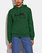 COACH®,HORSE AND CARRIAGE HOODIE IN ORGANIC COTTON,Organic Cotton,Dark Pine,Scale View