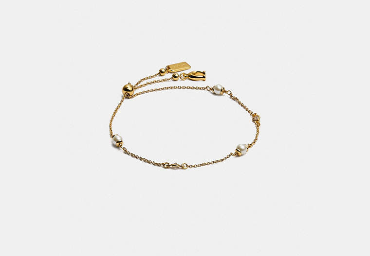COACH®,CLASSIC CRYSTAL PEARL SLIDER BRACELET,Brass,Gold,Front View