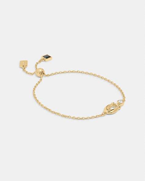COACH®,SIGNATURE CRYSTAL SLIDER BRACELET,Plated Brass,Mini,Gold/Clear,Front View