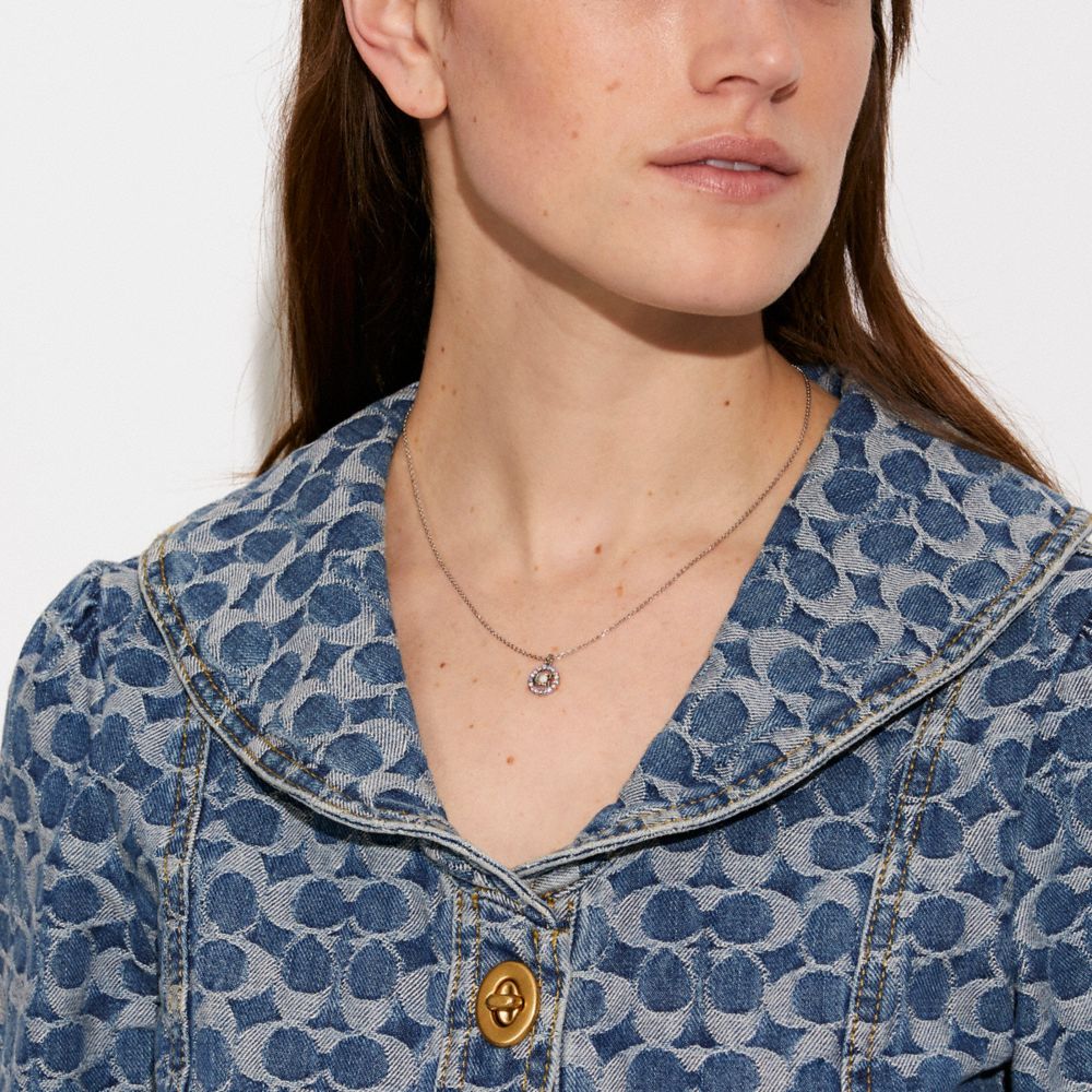 COACH®,Signature Multicolor Crystal Necklace,Single Strand,Cubic Zirconia,Gem Embellishment,Lettering Word,Pearl,Logo,Gold...,Clear,Detail View