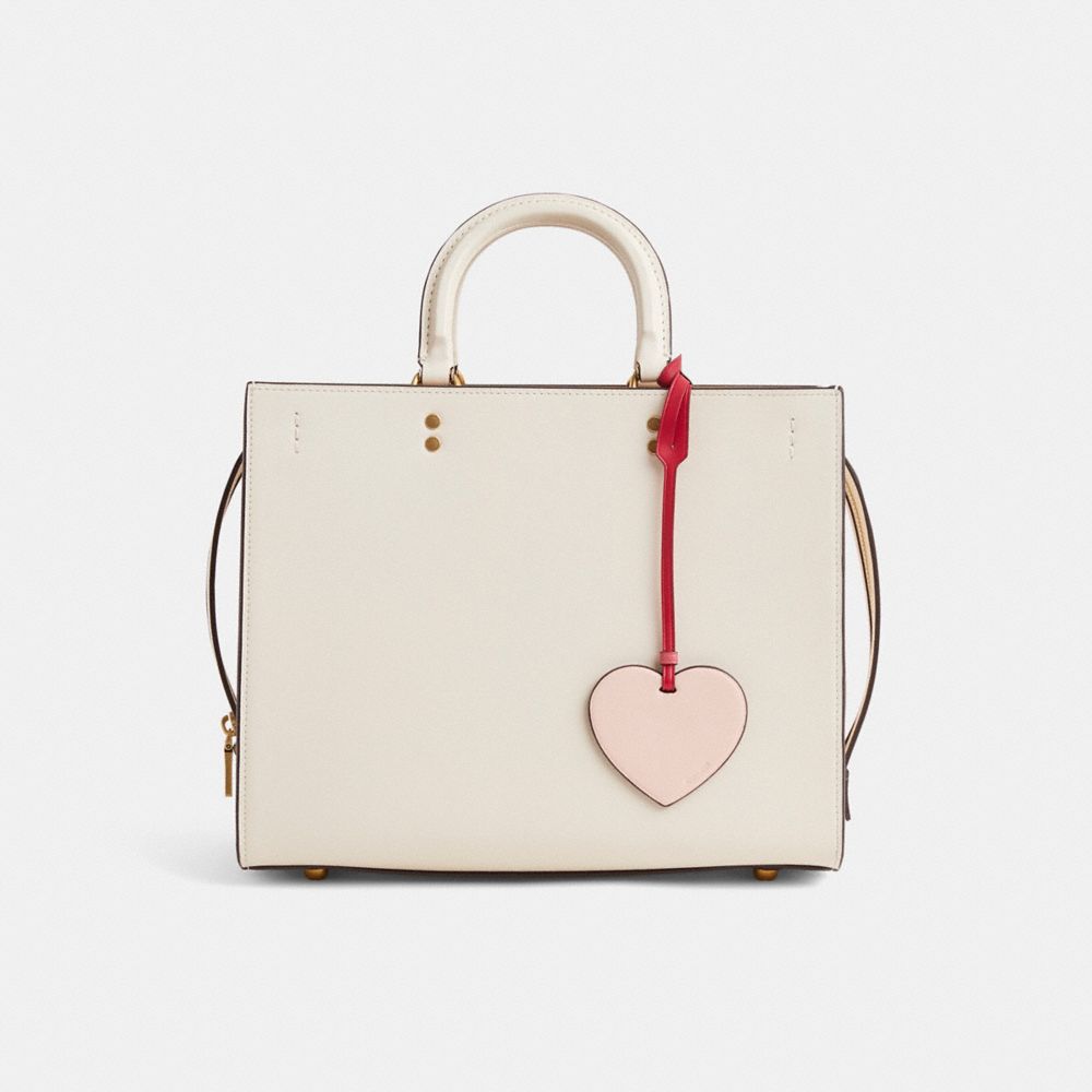 COACH®,BRELOQUE POUR SAC COEUR RÉINVENTÉE,Cuir galet,Rose/Multi,Angle View