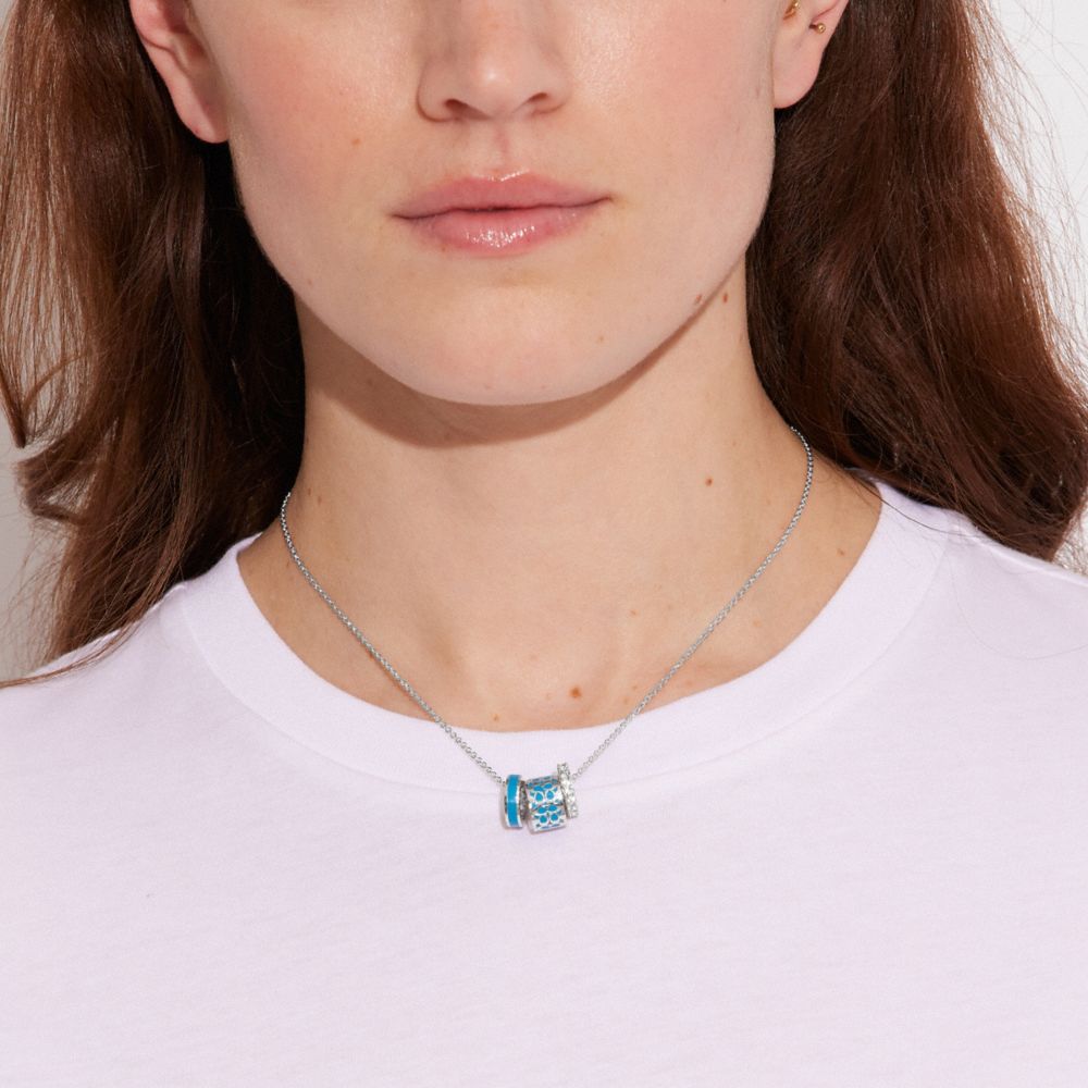 COACH®,Signature Enamel Necklace,Single Strand,Enamel,Bead Embellishment,Word Embellishment,Rhinestones,Logo,Silver Plated...,,Detail View