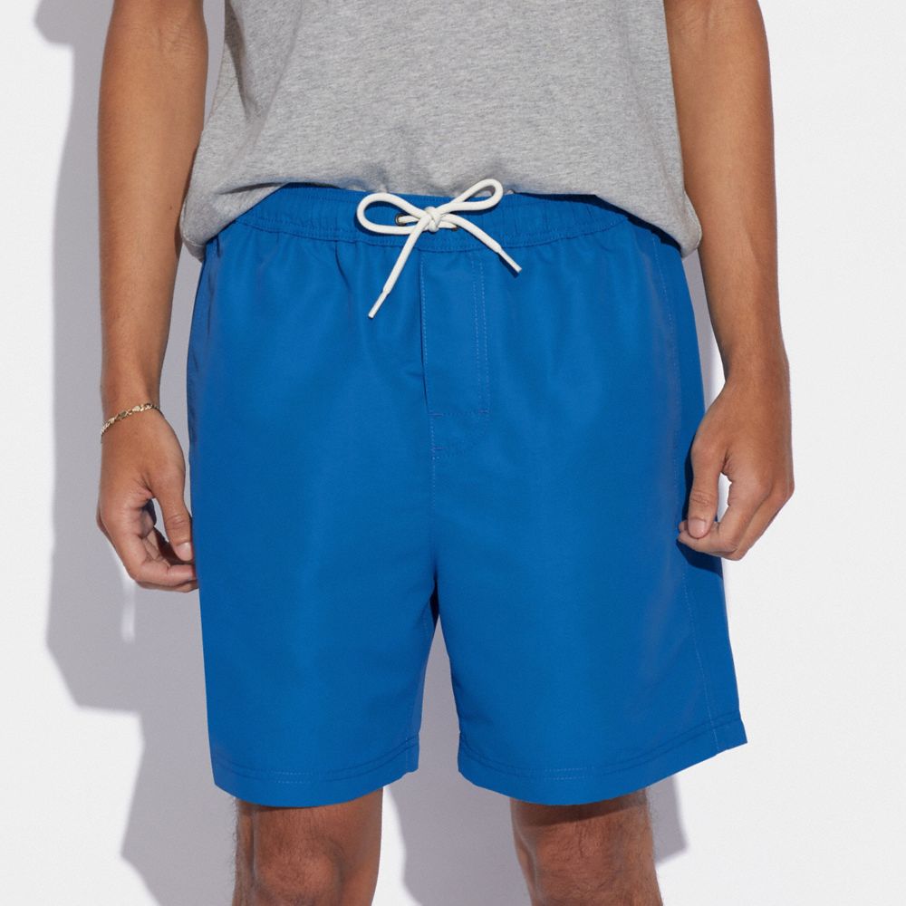 COACH®  Signature Swim Trunks