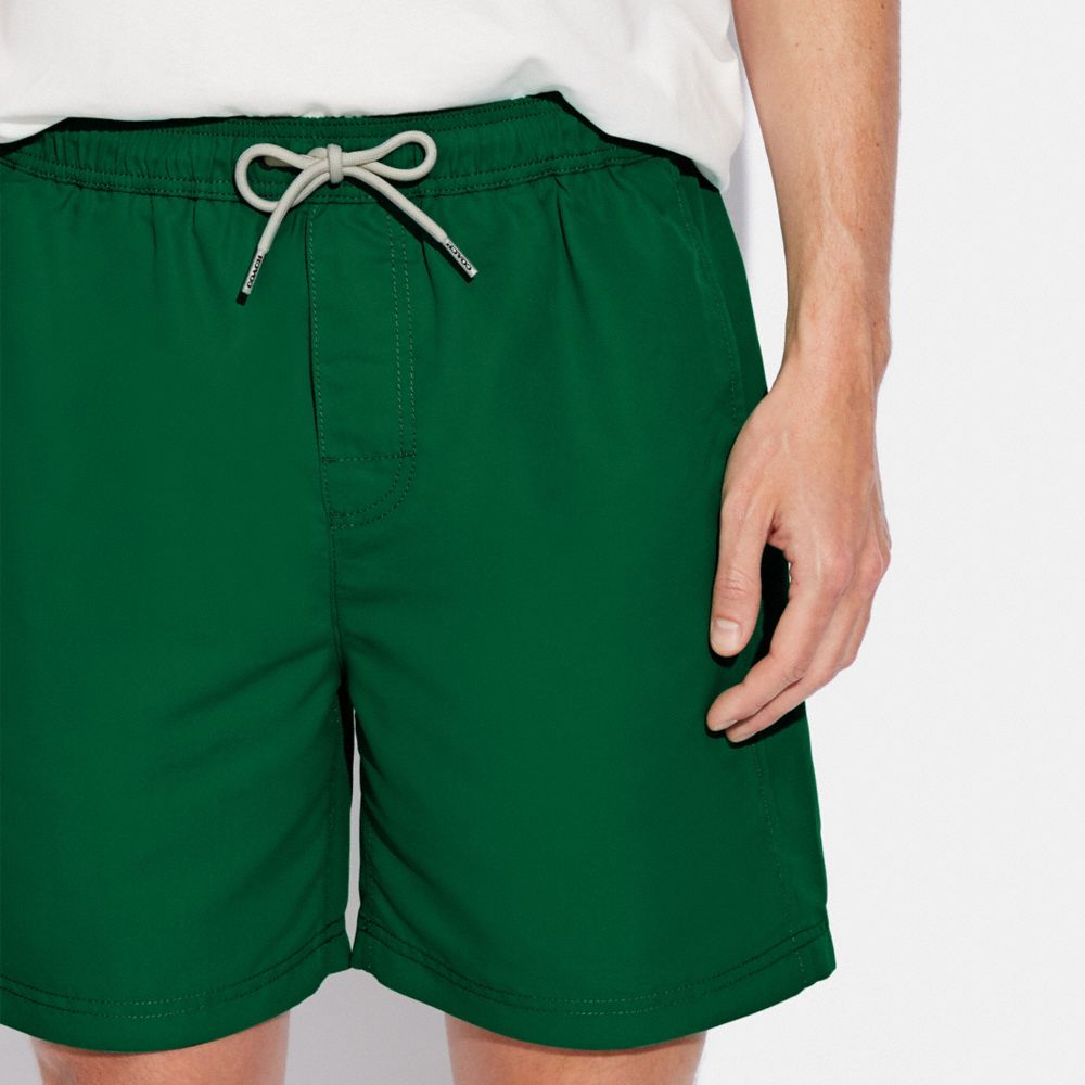 COACH®  Signature Swim Trunks