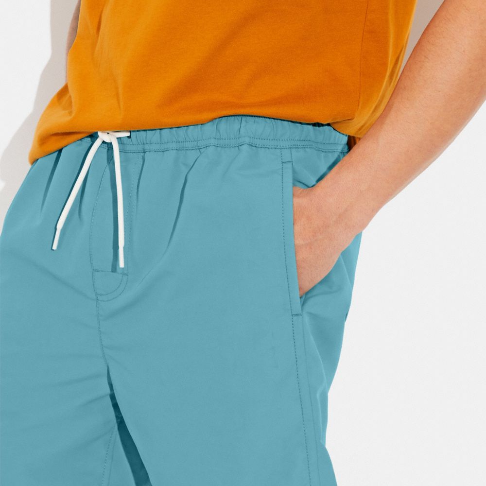 COACH®,Magic Print Signature Swim Trunks,,Detail View