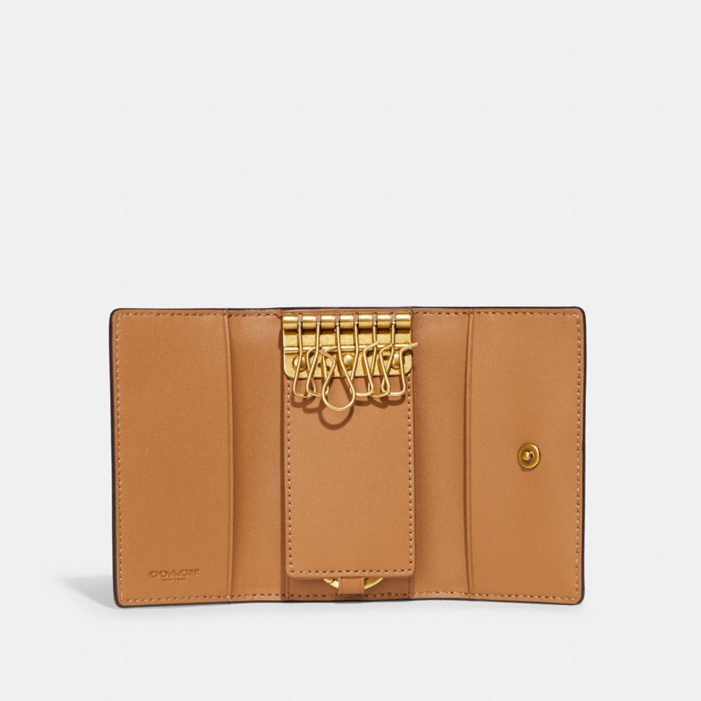 COACH®,6 リング キー ケース ウィズ ホース アンド キャリッジ プリント,キーケース,ﾌﾞﾗｽ/ﾁｮｰｸ ﾄｰﾌﾟ