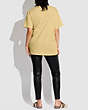 COACH®,T-SHIRT MADE IN NEW YORK,Coton organique,Jaune pastel,Scale View