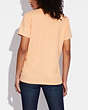 COACH®,HORSE AND CARRIAGE SIGNATURE T-SHIRT,Light Apricot,Scale View
