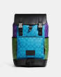 COACH®,TRACK BACKPACK IN BLOCKED SIGNATURE CANVAS,X-Large,Gunmetal/Bright Blue Multi,Front View