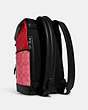 COACH®,TRACK BACKPACK IN BLOCKED SIGNATURE CANVAS,X-Large,Gunmetal/Light Orange Multi,Angle View