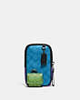 COACH®,MULTIFUNCTION PHONE PACK IN BLOCKED SIGNATURE CANVAS,Mini,Gunmetal/Bright Blue Multi,Front View