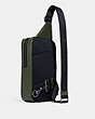 COACH®,SULLIVAN PACK IN SIGNATURE LEATHER,Smooth Calf Leather,Mini,Gunmetal/Dark Shamrock,Angle View