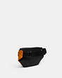 COACH®,TRACK BELT BAG IN BLOCKED SIGNATURE CANVAS,Medium,Gunmetal/Light Orange Multi,Angle View