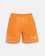 COACH®,MIXED MATERIAL SHORTS,cotton,Faded Orange,Front View