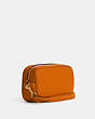 COACH®,JAMIE WRISTLET,Pebbled Leather,Small,Im/Light Orange,Angle View