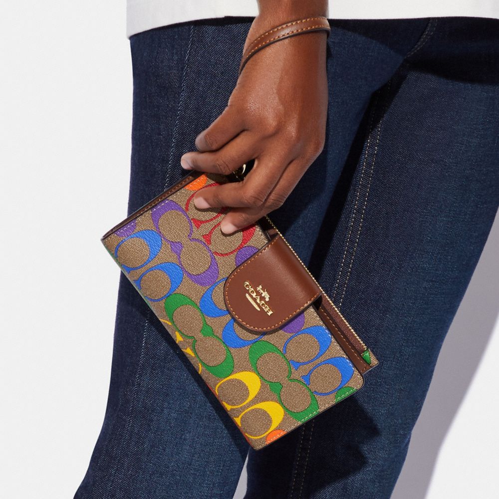 COACH OUTLET®  Tech Wallet In Signature Canvas With Wildflower Print