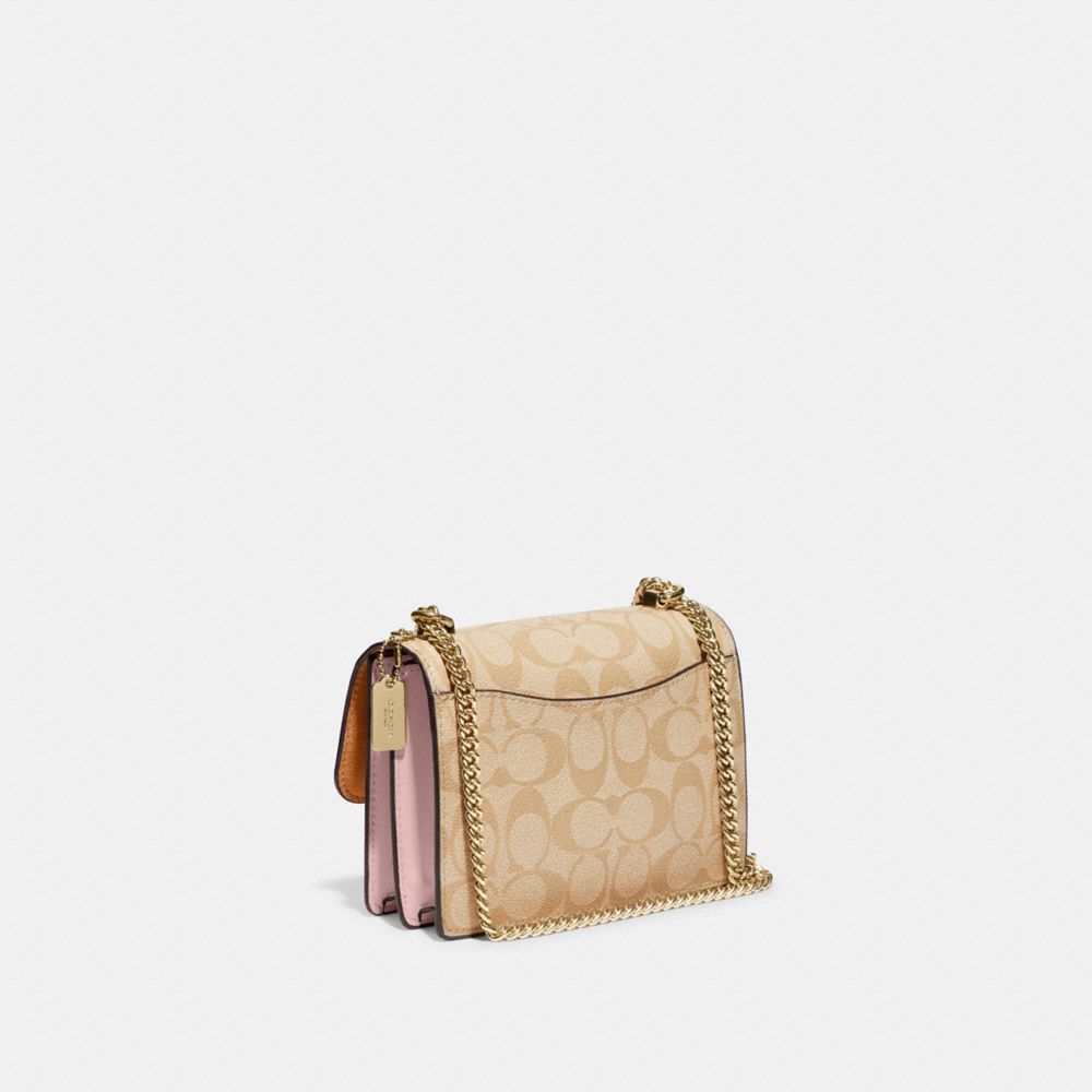 Coach small pink online purse