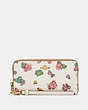 COACH®,LONG ZIP AROUND WALLET WITH SPACED FLORAL FIELD PRINT,Mini,Gold/Chalk Multi,Front View