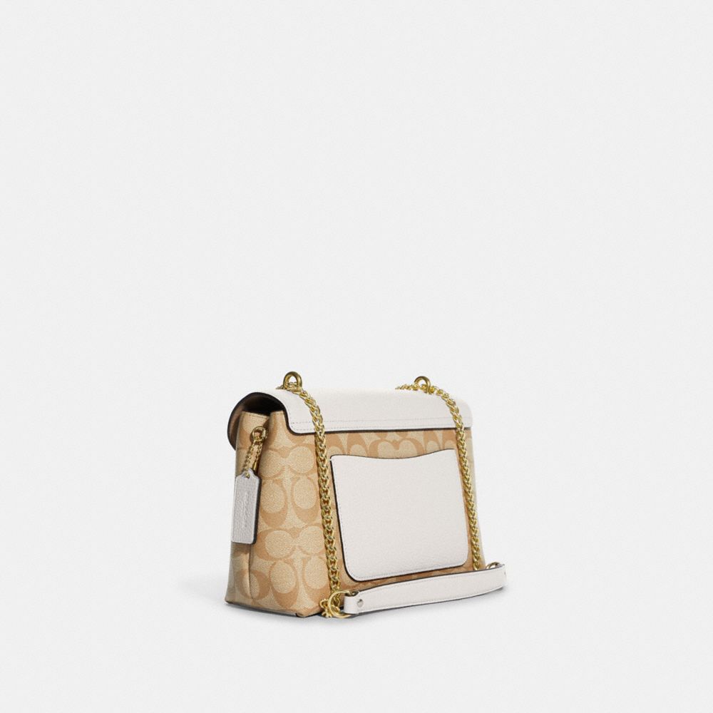Tammie Shoulder Bag In Signature Canvas With Floral Whipstitch